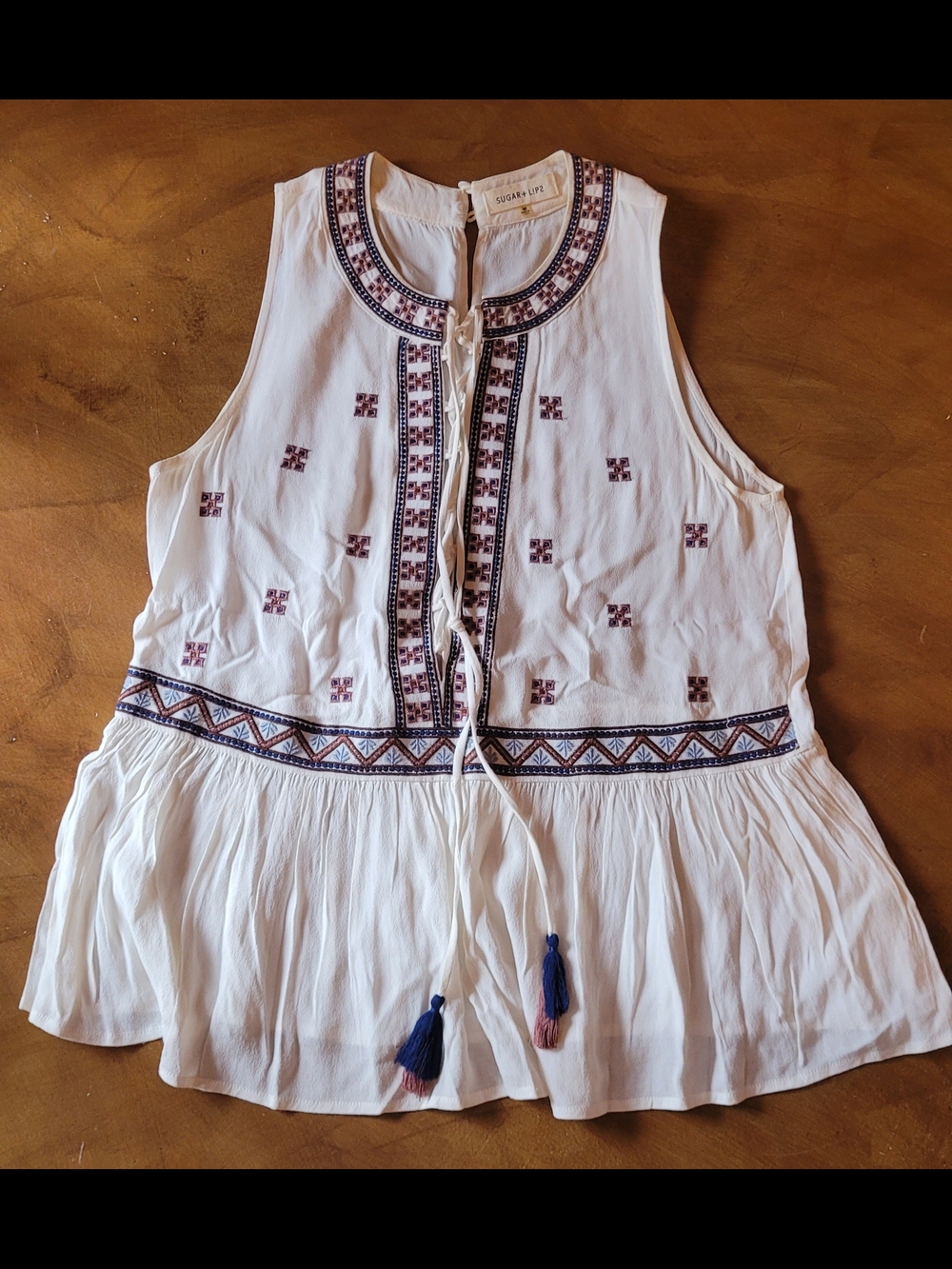 Sugarlips Cream Sleeveless Embroidered Tassel Peplum Top